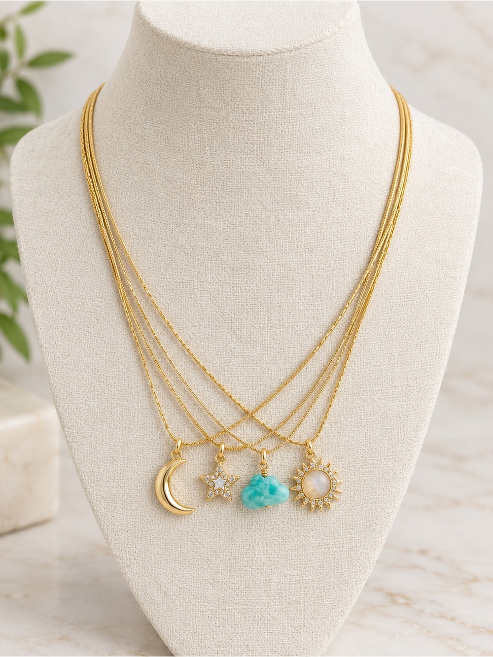 Luna Norte Gold Plated Layered Charm Necklace with Moon, Star, Turquoise & Sun